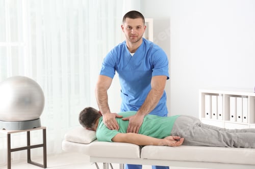 Preview: Doctor working with patient in hospital. Rehabilitation massage
