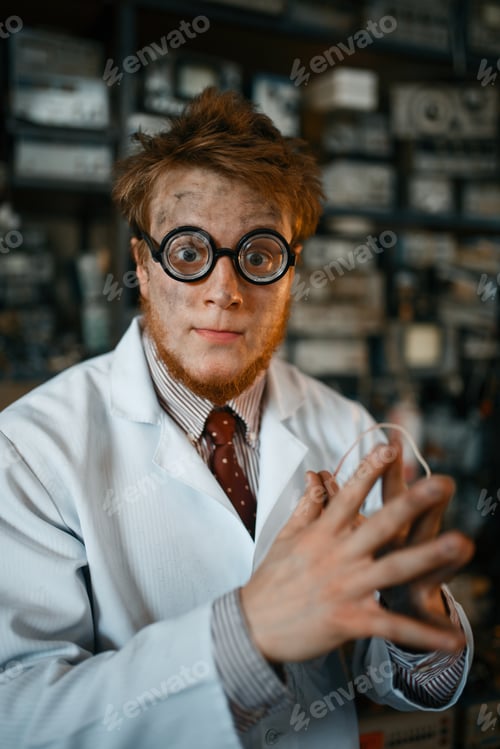 Preview: Crazy male scientist working in laboratory