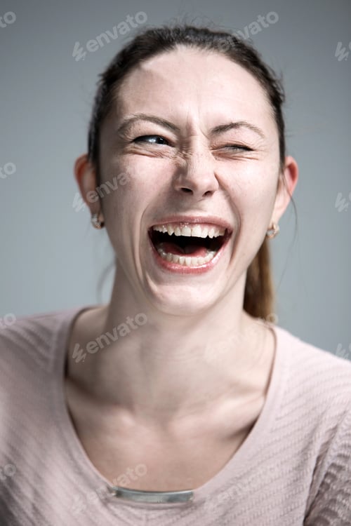 Preview: The Happy Woman On Gray Background
