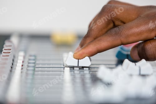 Audio visual sound mixer hands control buttons adjsuting Kenya East Africa