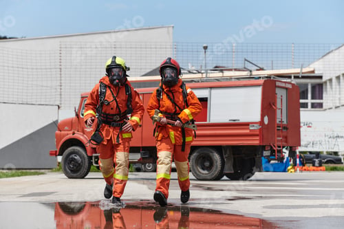 Preview: A team of confident and accomplished firefighters strides purposefully in their uniforms, exuding