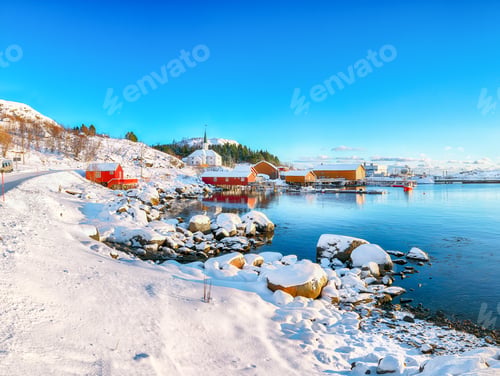 Preview: Stunning winter scenery of Moskenes village with ferryport and famous Moskenes parish Churc