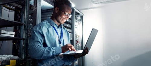 Preview: Laptop, server room and black man on network for maintenance, programming software or typing. Tech,