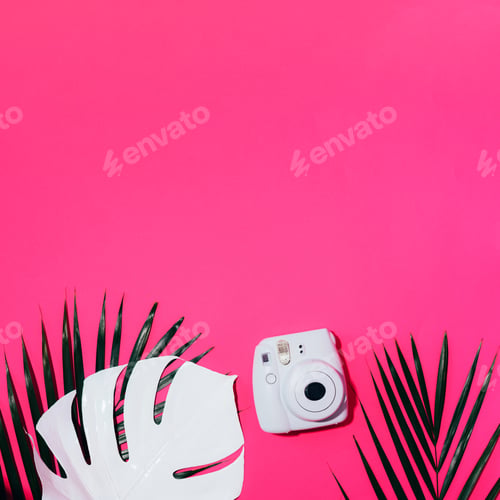 Preview: Vilnius, Lithuania - September 16, 2019: FUJIFILM INSTAX Mini Instant Film Camera on pink background