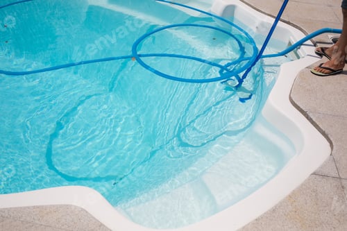 Preview: cleaning pool with vacuum cleaner. Cleaning equipment for small pools.