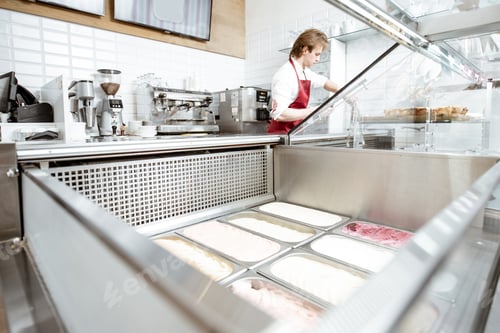 Preview: Salesman making ice cream in the pastry shop