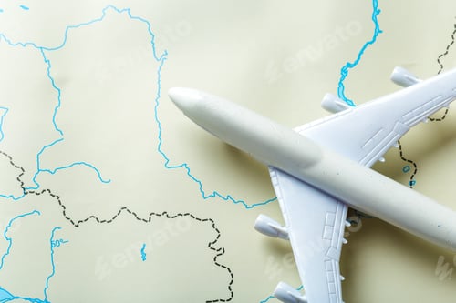 Preview: miniature of a passenger aircraft flying on a map