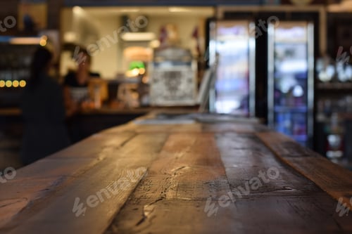 Preview: Rustic wooden table at a diner with selective focus and defocused interior