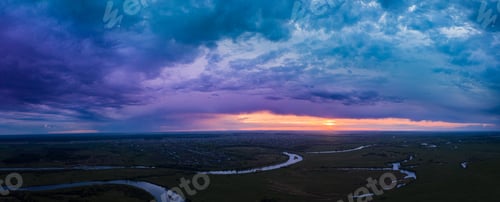 Preview: Sunset above river. evenig Panorama Aerial View Green forest And River Landscape. Top View Of