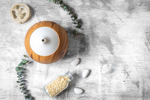 Preview: Spa composition with aroma diffuser on a textured background, flat lay.