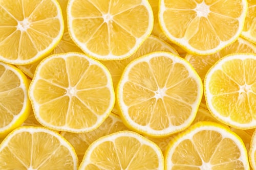 Preview: Slices of fresh lemon as background, top view