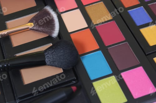 Preview: Brightly Colored Cosmetic Pigment Palettes With Various Cosmetics