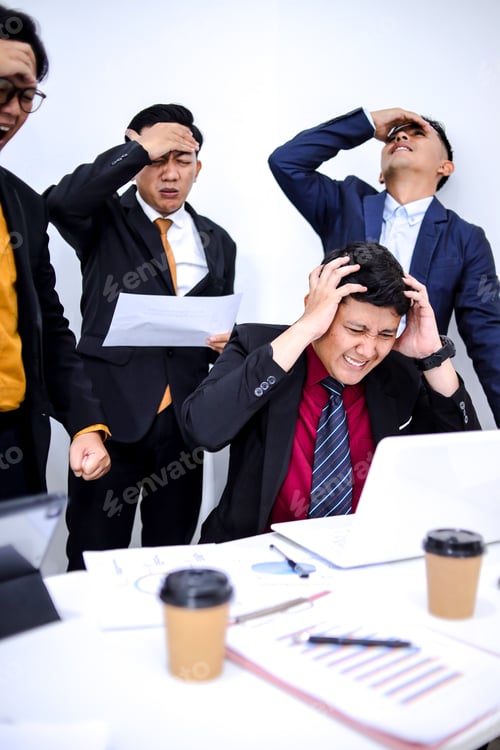 Preview: Stressed Businessmen in Office Setting Convey Frustration And Anxiety