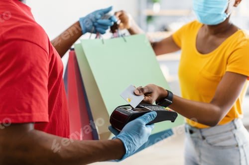 Preview: African Woman Paying Courier For Delivery Service At Home, Cropped
