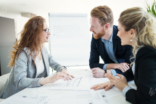 Preview: Business people working together on project and brainstorming in office