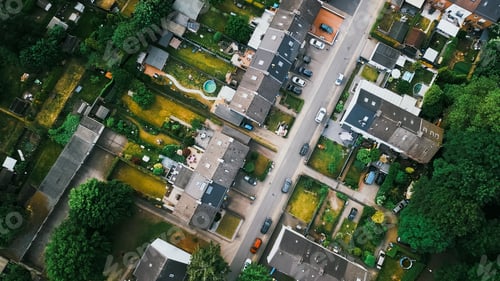 Preview: Scenic landscape from above aerial view of houses in small town in countryside Germany .