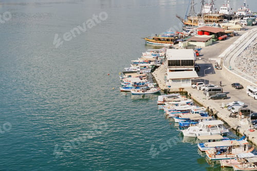 Preview: Turkey, Alanya, July 2021. Marina Bey, view of the city on the sea coast, boats. Travel background