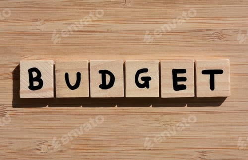Preview: Budget, word in 3D wooden alphabet letters on a bamboo wood background.as banner headline