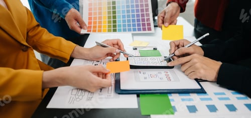 Preview: UX developer and ui designer brainstorming about mobile app interface wireframe design with customer
