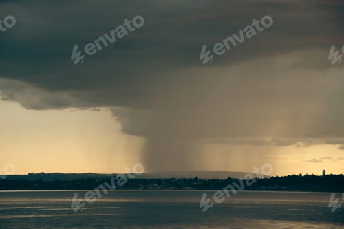 Preview: Heavy dark fast moving thunderstorm clouds over lake Constance, Germany