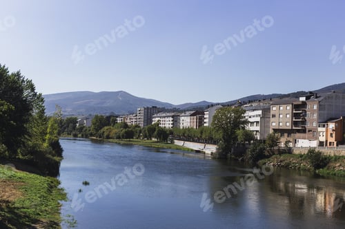 Preview: Buildings on the bank of the river during daytime
