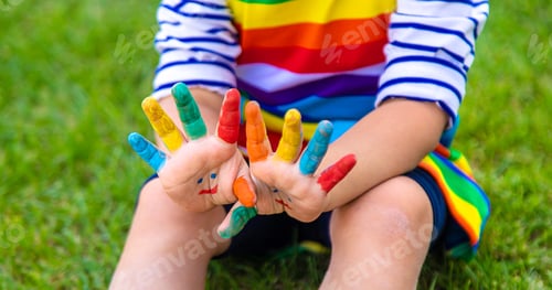 Preview: Child in hand draw smile. Selective focus.