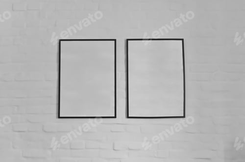 Preview: two photo frames with copy space hanging on white bricks wall, interior decor mock up.