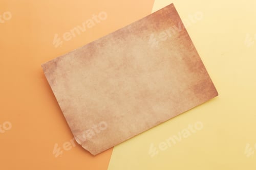 Preview: old vintage paper on color background close up