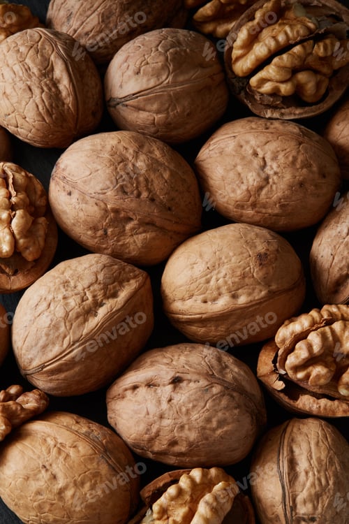 Preview: Close-up crop of walnuts as food backdrop composition
