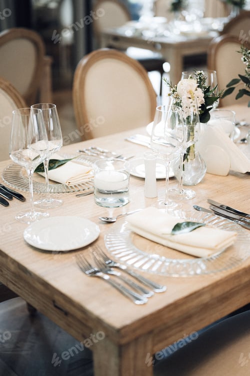 Preview: Beautiful wedding table setup with vibrant floral decorations.