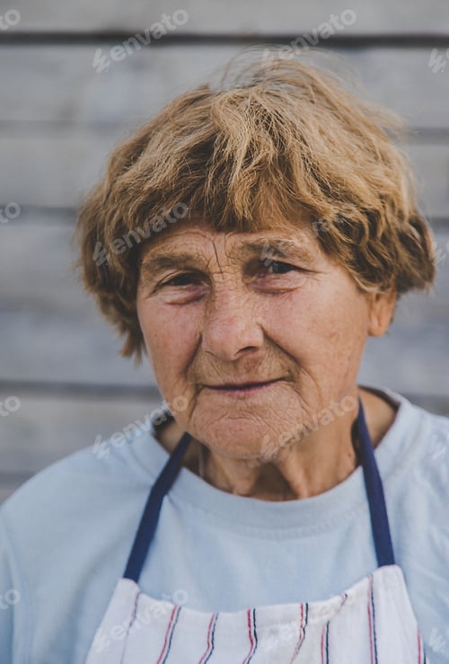 Preview: Portrait of an old woman. Selective focus.