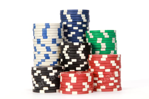 Preview: Stack of various poker chips on white background