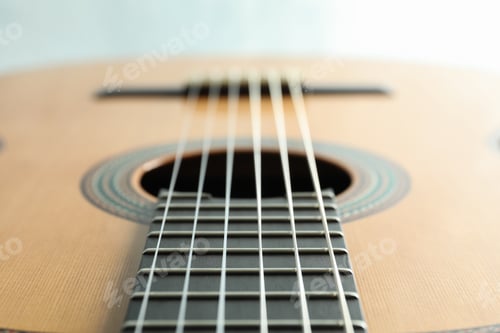 Preview: Beautiful six - string classic guitar on white background, closeup