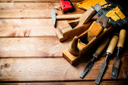 Preview: Various working tools on wood on the table.