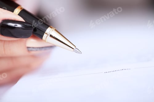 Preview: Signing Documents with Pen on Paper in Office