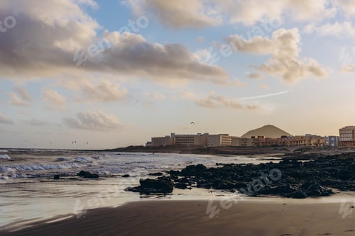 Preview: Sunrise light shining on ocean waves in Tenerife