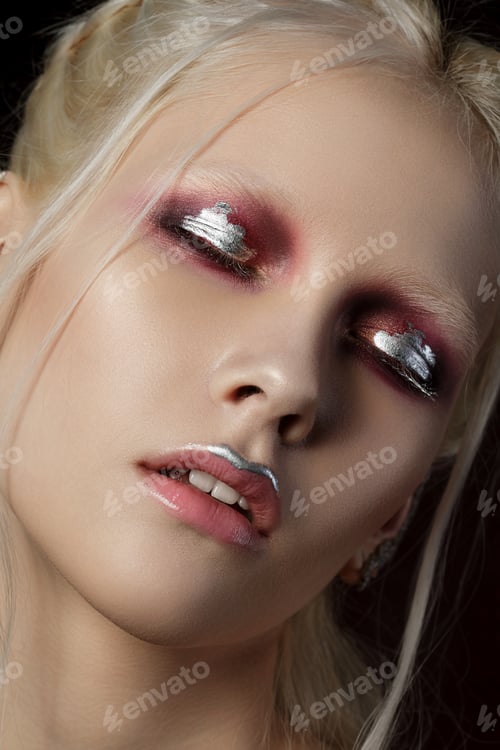 Preview: Young beautiful woman with fashion make up