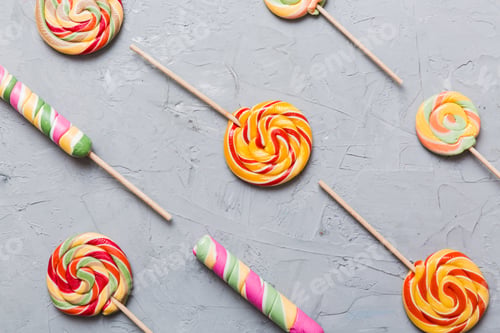 Preview: Set of colorful lollipops on colored background. Summer concept.