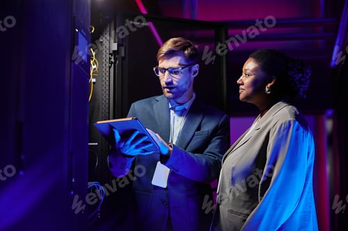 Preview: Two Technicians in Server Room