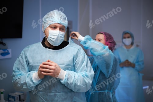 Preview: Medical Professionals Preparing for Surgery in Hospital Setting