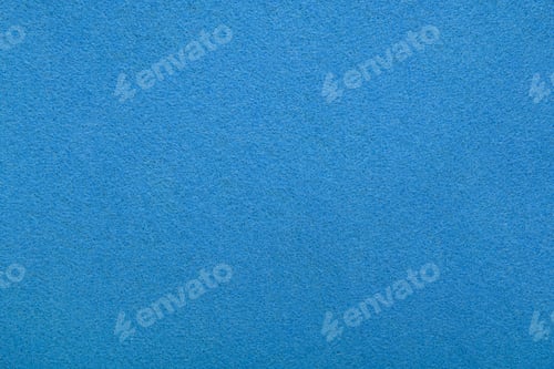 Preview: Light blue felt texture background - close-up of soft fabric surface.