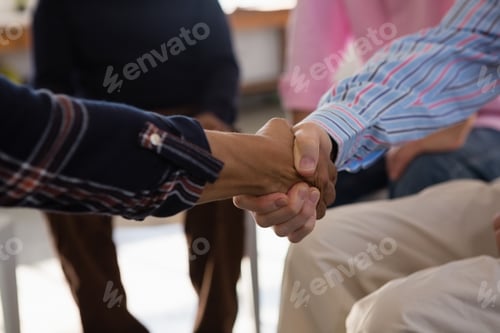 Preview: Close up of friends doing handshake