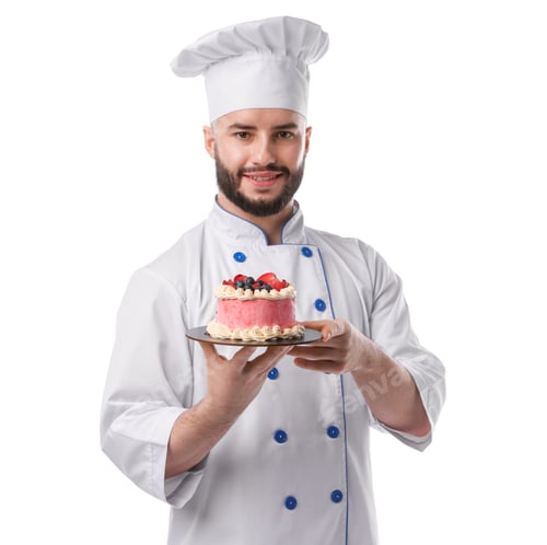 Preview: Happy confectioner in uniform holding delicious cake with berries on white background
