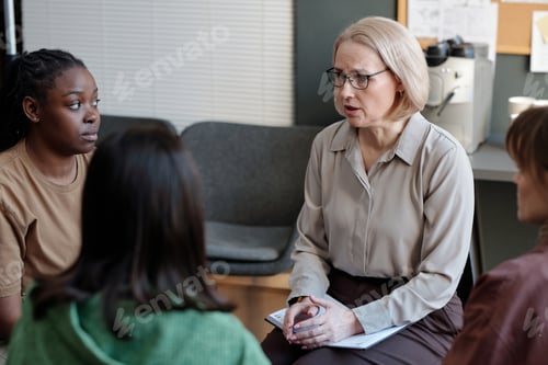 Preview: Psychologist giving advice to patient