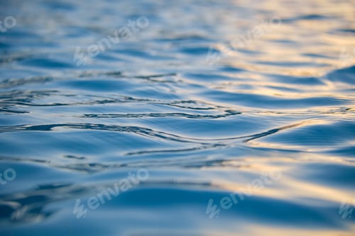 Vista previa: Closeup seascape surface of blue sea water with small ripple waves.