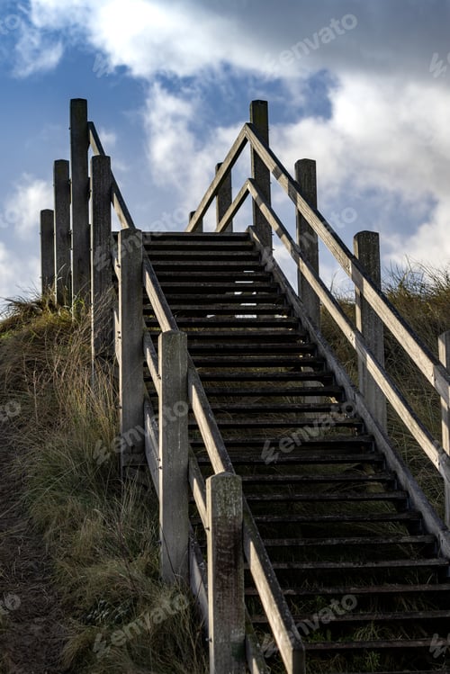 Preview: Wooden stairs going up on the hill in Breskens