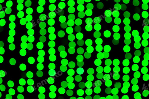 Preview: Unfocused abstract green bokeh on black background. defocused and blurred many round light