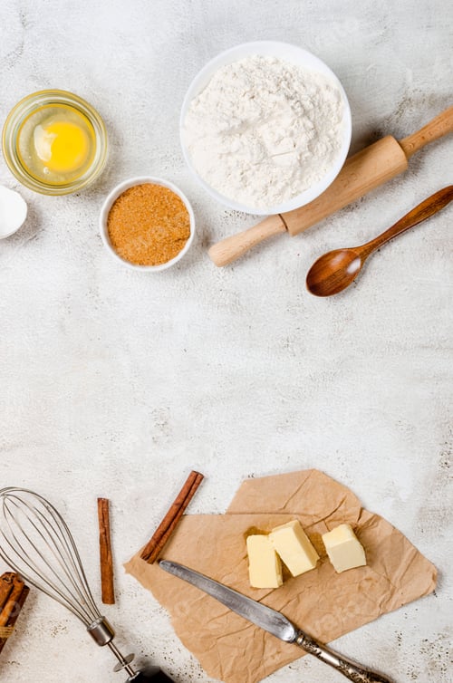 Preview: Ingredients for making dough dishes: cakes, cookies, muffins, pies on a gray background.