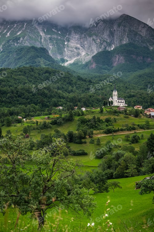 Preview: Drežnica village near Kobarid, under Mount Krn Slovenia. Picturesque rural green landscape