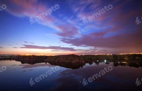 Preview: Beautiful night sky at the river with stars and clouds